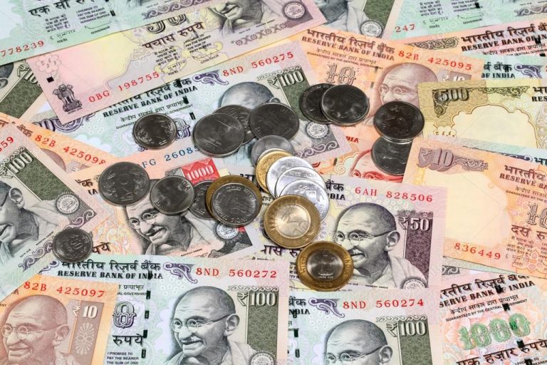 depositphotos_76375731-stock-photo-indian-currency-notes-and-coins