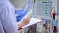 Dialysis nurse are checking dialysis machine before hemodialysis replacement kidney dysfunction or renal failure in intensive care unit.